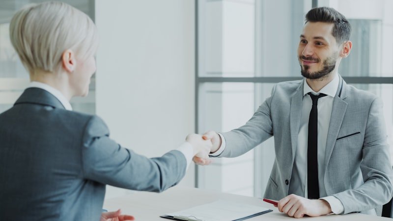 Business handshake sealing a project agreement